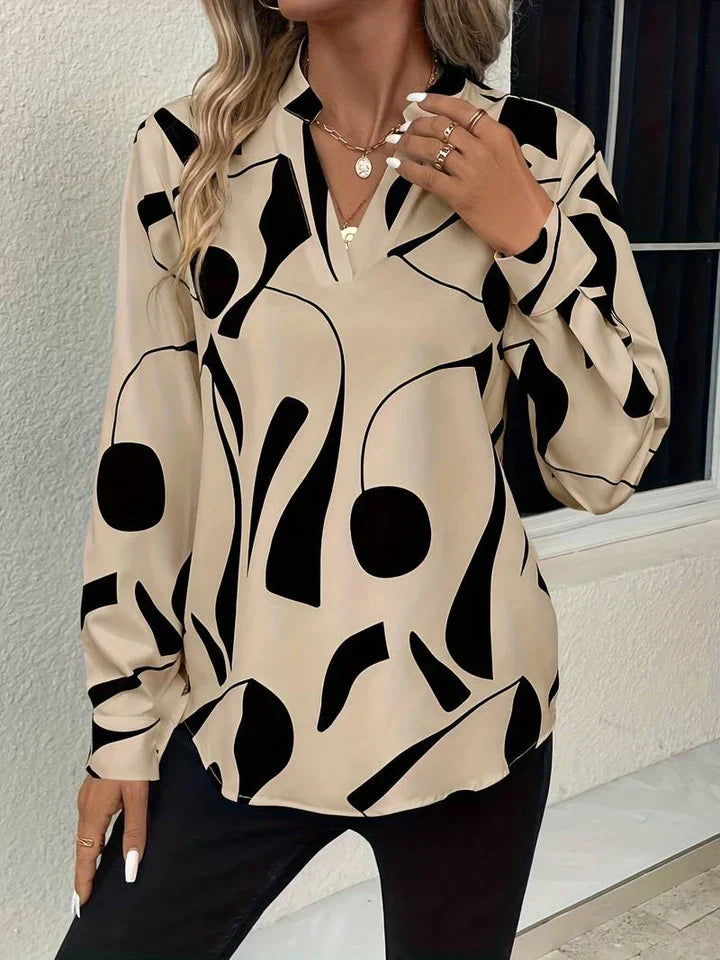 Elegante Damen-Bluse mit modernem abstraktem Muster und V‑Ausschnitt