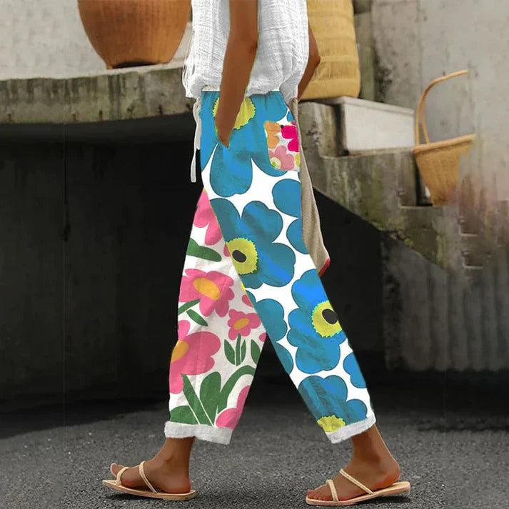 Damen Freizeithose mit Blumenmuster – Locker geschnittene Sommerhose mit elastischem Bund – Bequeme Leinenhose für Urlaub & Alltag
