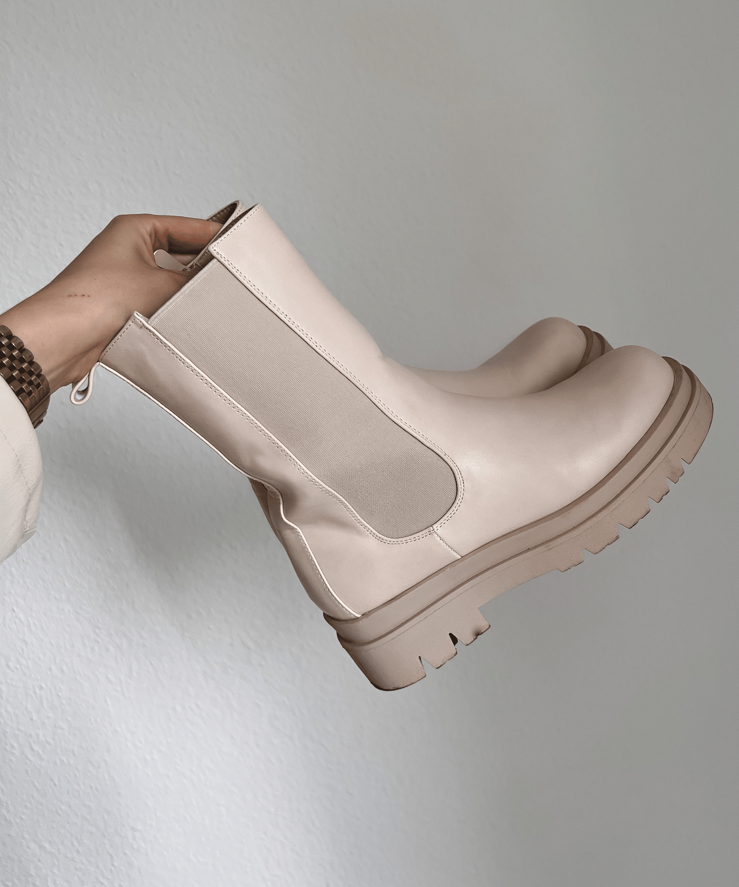 Lange beige Stiefel