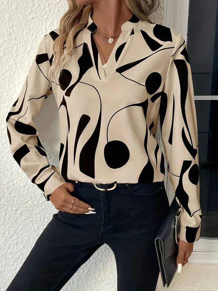 Elegante Damen-Bluse mit modernem abstraktem Muster und V‑Ausschnitt