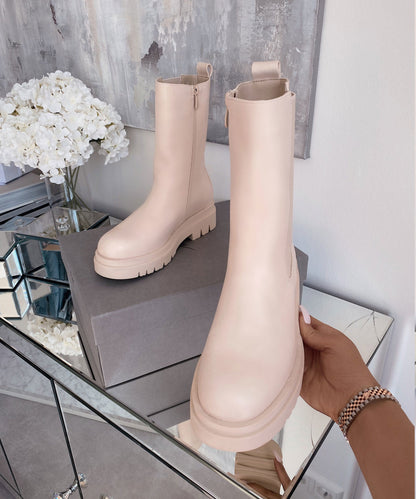 Lange beige Stiefel