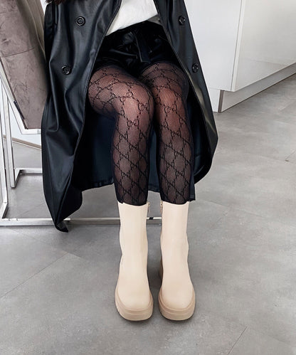 Lange beige Stiefel