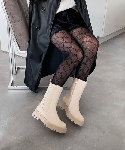 Lange beige Stiefel