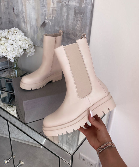 Lange beige Stiefel